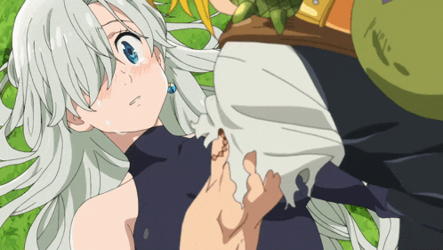 a woman with long white hair is laying on the grass with a man holding her breast