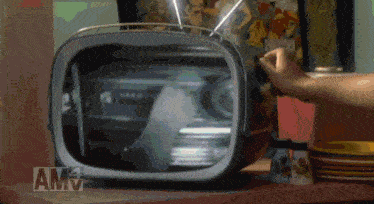 a tv that has amv written on the bottom right