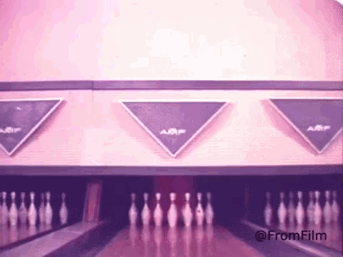 a bowling alley with a sign that says a & f