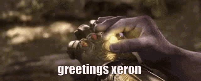 a person holding a light in their hands with the words greetings xeron