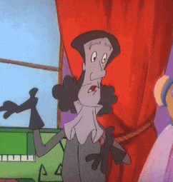 a cartoon character standing in front of a red curtain