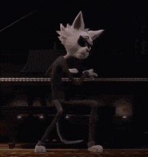 a cartoon cat is standing in front of a piano