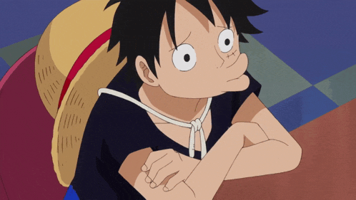 a cartoon character with a straw hat on his head