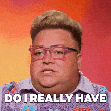 a man wearing glasses and a purple shirt says " do i really have "