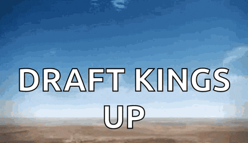 a sign that says draft kings up with a blue sky in the background