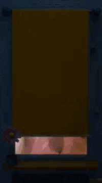 a pixelated image of a woman in a pink shirt smiling in front of a mirror