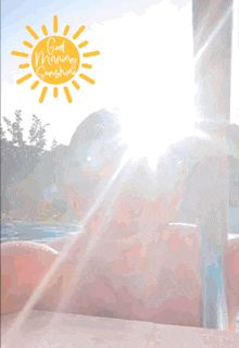 a shirtless man is smiling in a pool with a sun that says good morning sunshine on it