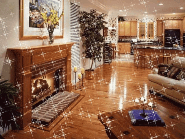 a living room with a brick fireplace and a couch