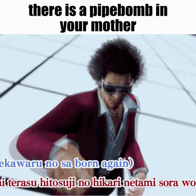 a man with sunglasses and a red jacket says there is a pipe bomb in your mother