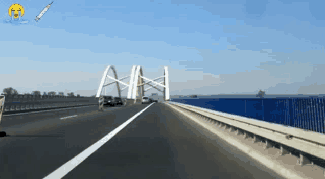 a bridge with the letter a on it and a crying face