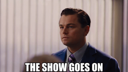wolf-of-wall-street-the-show-goes-on.gif