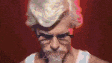 a blurred image of a man with the word empire written on the bottom