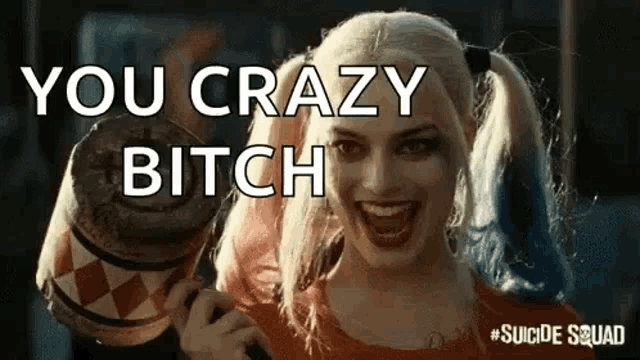 harley quinn from suicide squad is holding a microphone and smiling while holding a microphone .