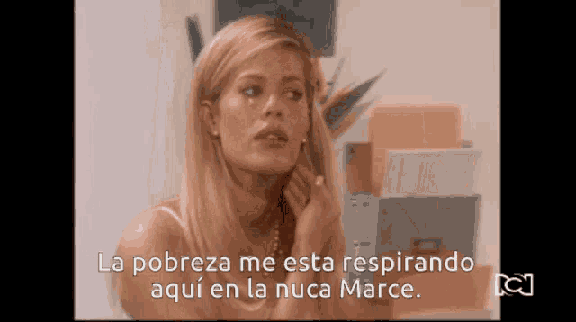 a woman says la pobreza me esta respirando aqui en la nuca marce in spanish
