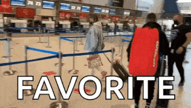 a person with a red wilson bag is walking through an airport with the words favorite written on the bottom