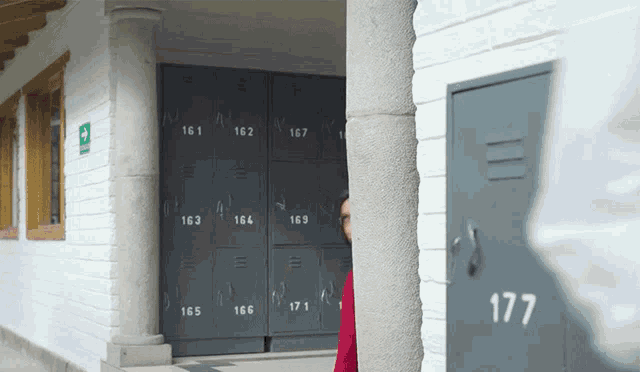a row of lockers with the number 177 on the door