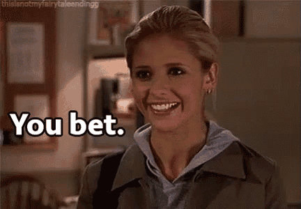 a woman is smiling and says `` you bet '' while standing in a room .
