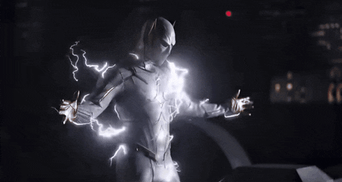 a man in a white superhero suit is surrounded by lightning bolts