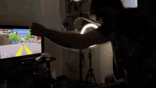 a person is playing a video game on a tv screen
