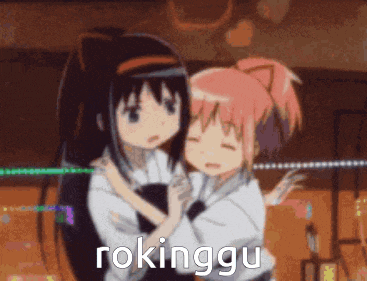 a couple of anime girls hugging each other with rokinggu written on the bottom right