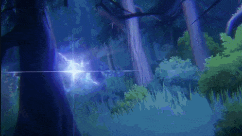 a purple light is shining through the trees in a forest at night .