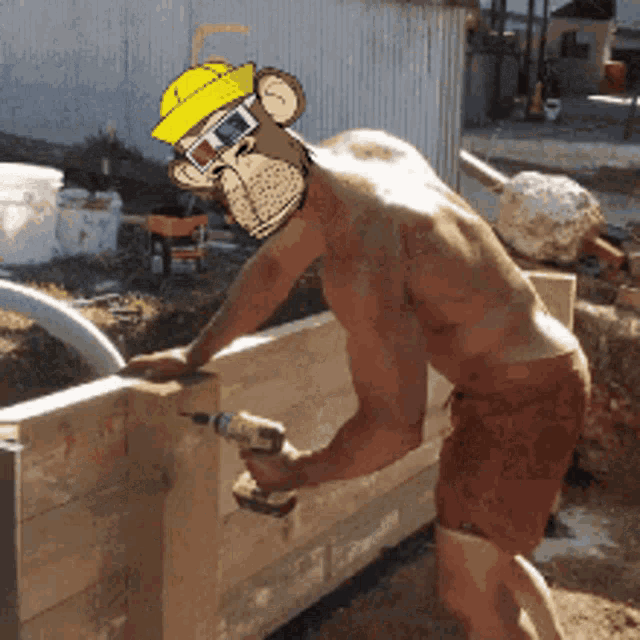 a shirtless man wearing a monkey mask is using a drill on a wooden post