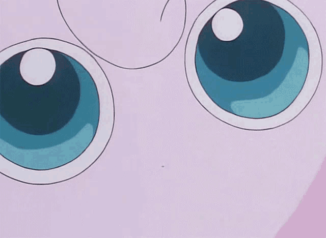 a close up of a cartoon character 's eyes with a blue background
