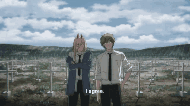 a man and a woman are standing in front of a cemetery and the woman says i agree