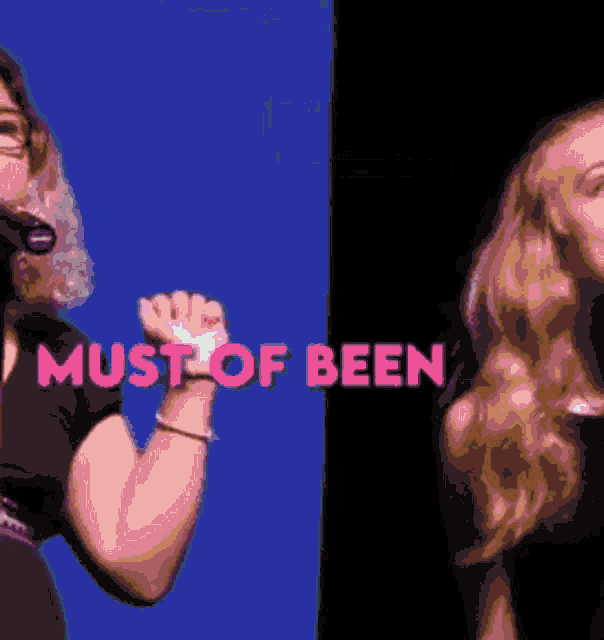 a woman singing into a microphone with the words must of been in pink letters