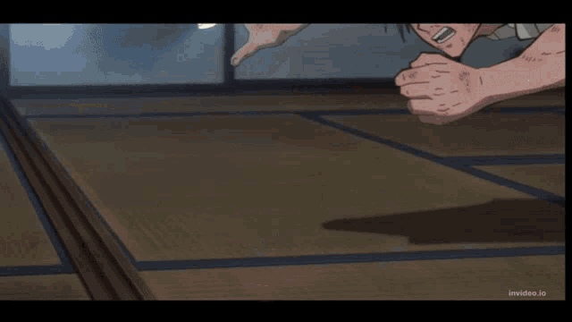 a cartoon of a man laying on the floor with invideo.io written in the corner
