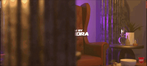 a poster for a film by upendra shows a chair and a table