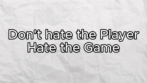 a piece of crumpled paper with the words " do n't hate the player hate the game " on it