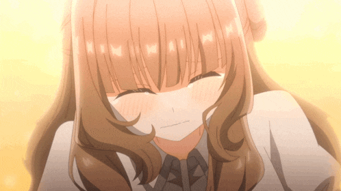 a close up of a girl with brown hair