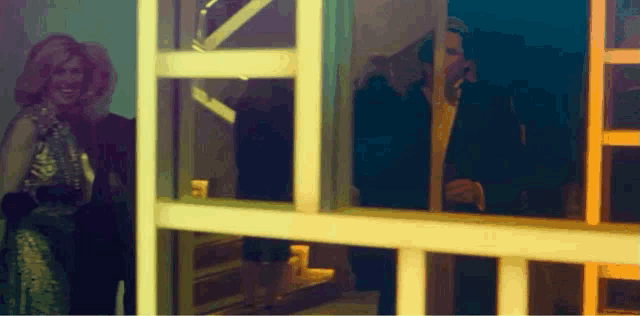 a painting of a woman standing in front of a window with a yellow frame