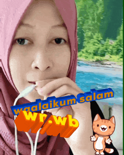 a woman wearing a hijab is holding a sign that says waldaiku salam