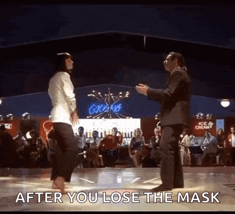 a man and woman are dancing on a dance floor .