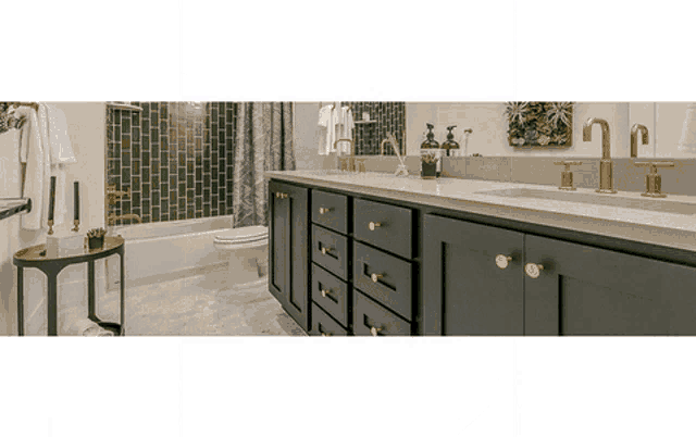 a bathroom with two sinks a toilet and a bathtub