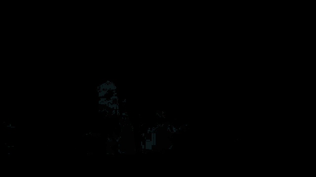a soldier is laying on the ground in a dark room