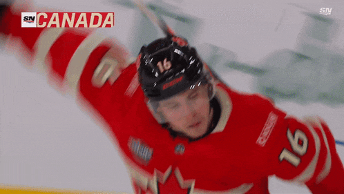 a hockey player with the number 16 on his chest