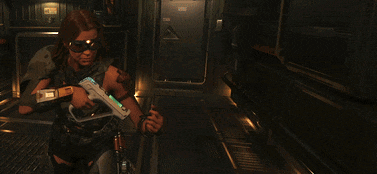 a woman is holding a gun in a dark room with a sign that says ' emergency exit ' on it