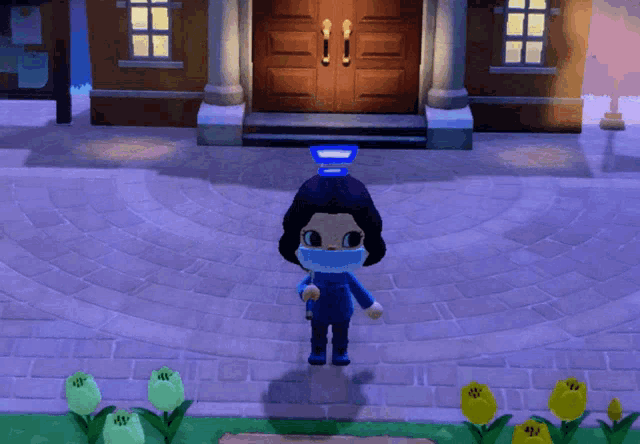 a video game character wearing a blue mask stands in front of a house