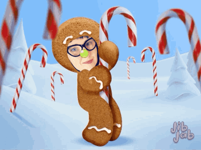 a gingerbread man holding a candy cane with jib jab on the bottom