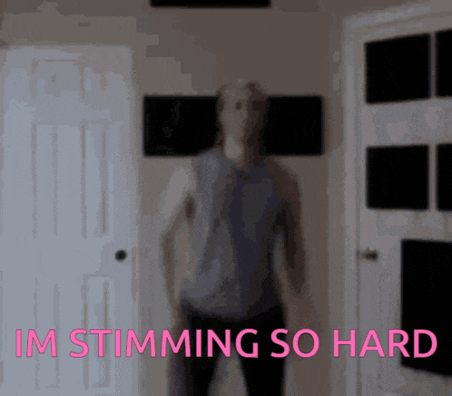 a man is standing in front of a door with the words im stimming so hard written in pink