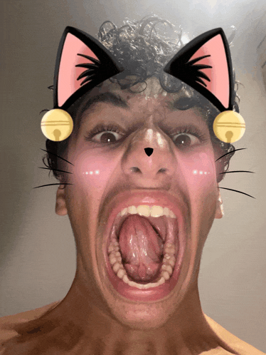 a man wearing cat ears and bells on his ears