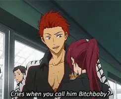 a man with red hair is talking to a woman with a ponytail and the words " cries when you call him bitchbaby "