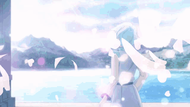 a person standing in front of a body of water