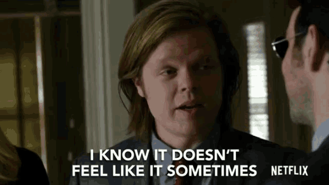 a man in a suit and tie is saying i know it does n't feel like it sometimes netflix