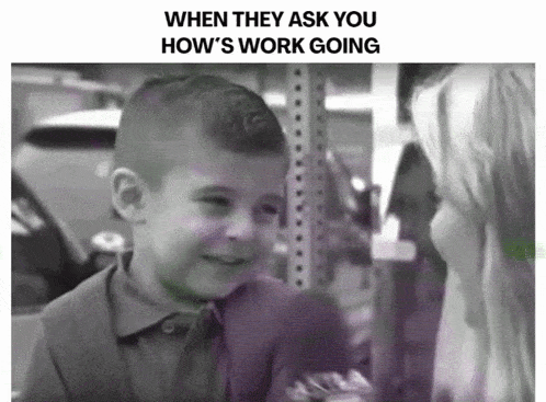 a black and white photo of a young boy and a woman with the caption when they ask you how 's work going