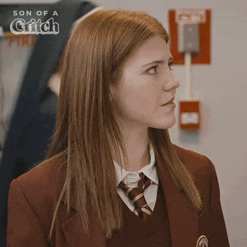 a woman in a school uniform with the words son of a critch on the bottom