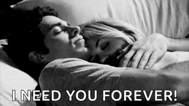 a man and a woman are hugging each other in bed and the man is saying `` i need you forever '' .